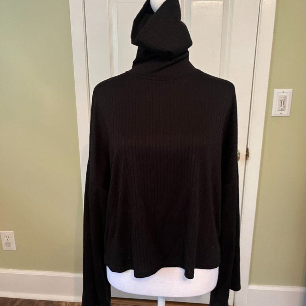 Oversized black turtleneck top
